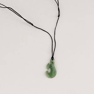 Jade fish hook necklace.